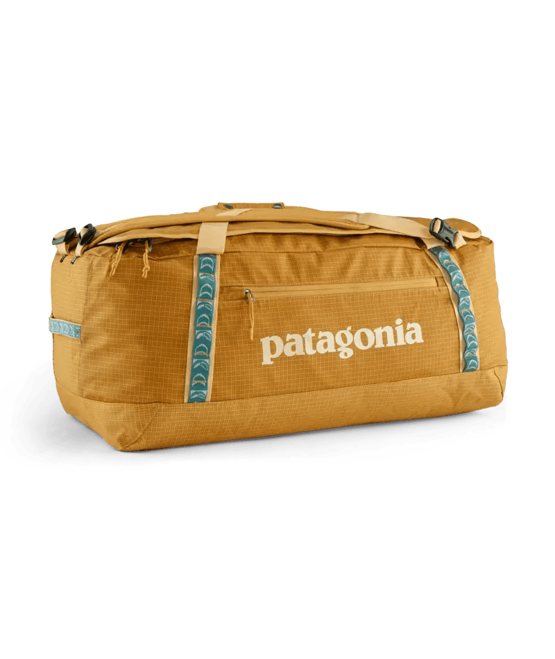 Black Hole Duffel 70L in Pufferfish Gold | Patagonia Bend