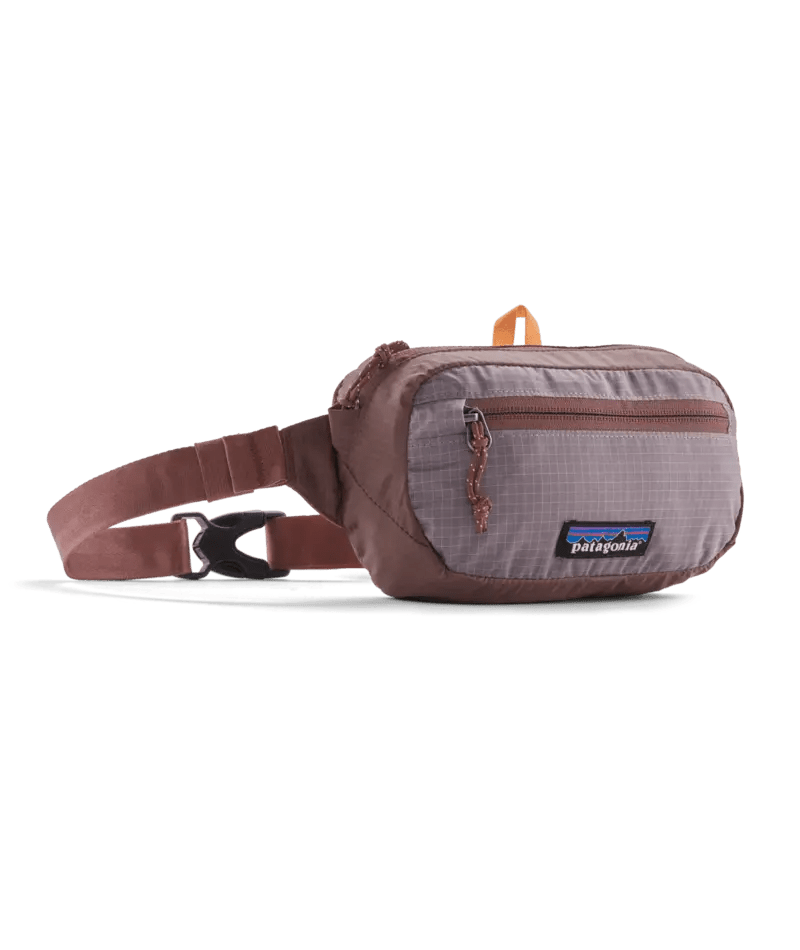 Ultralight Black Hole® Mini Hip Pack in Dulse Mauve | Patagonia Bend