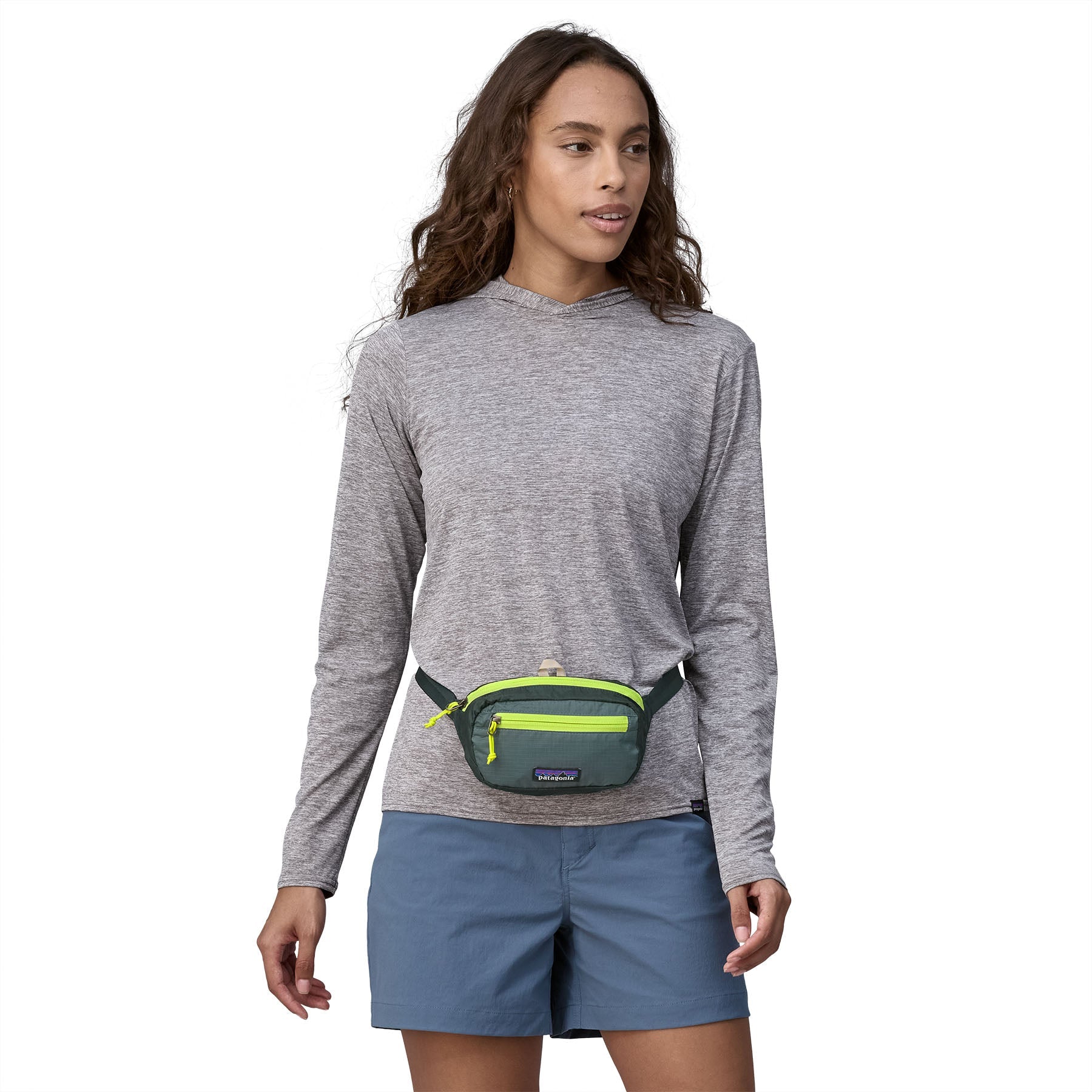 Ultralight Black Hole® Mini Hip Pack in Nouveau Green | Patagonia Bend